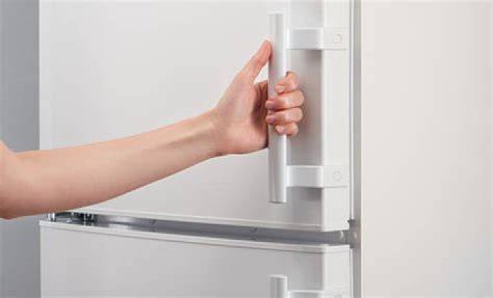 How do you glue a fridge door handle