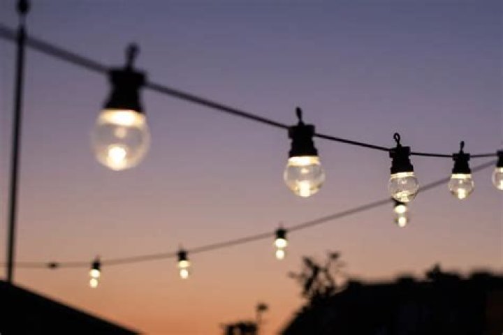 How do you hang lights on a campsite