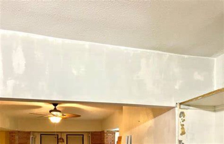 How do you hide uneven ceiling paint