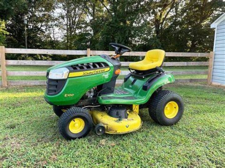 How much does a John Deere e100 weight